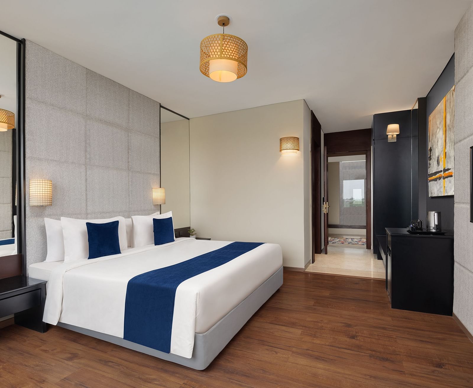 Premium Room at Essentia Luxury Hotel, Indore with a double bed and a television