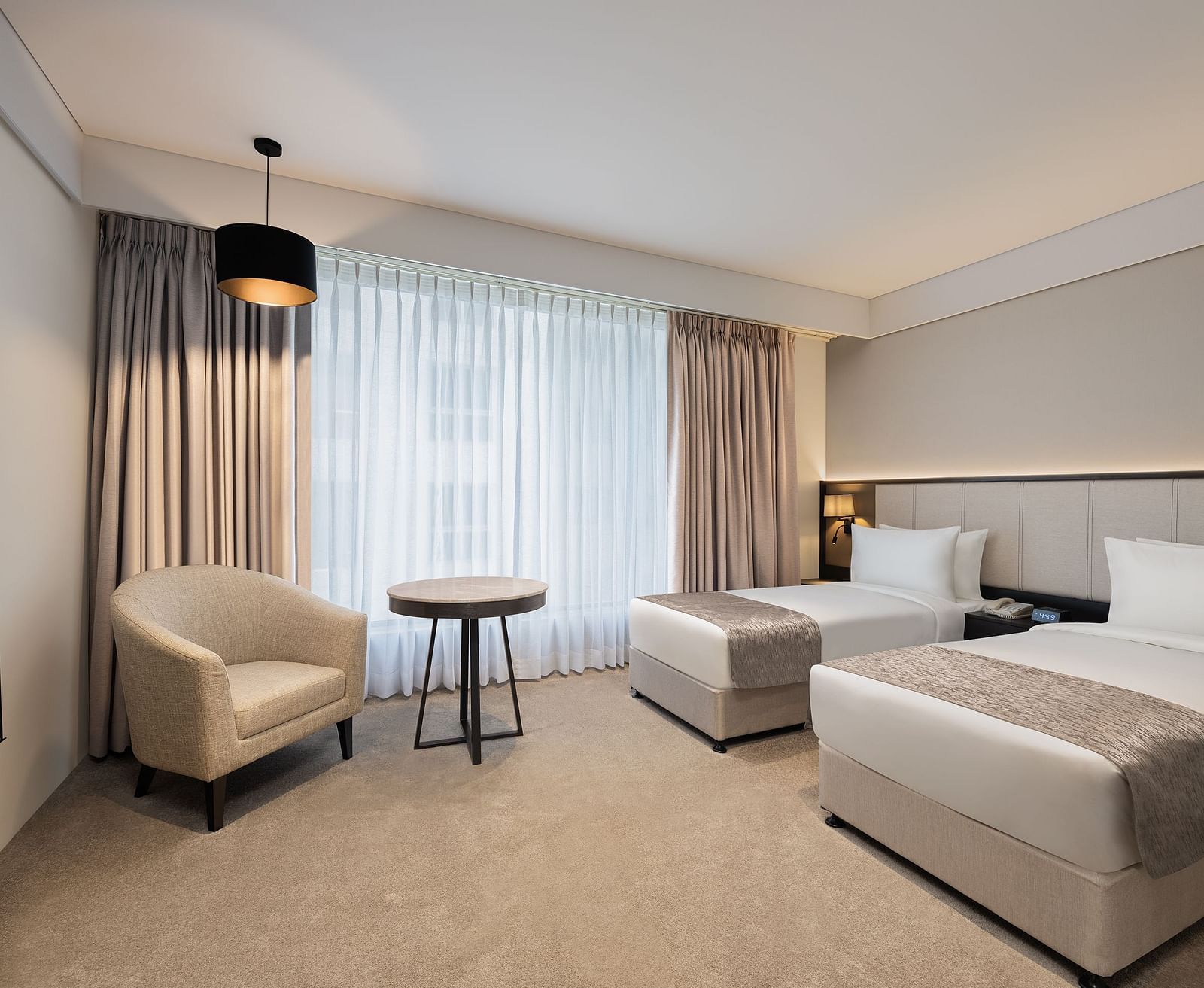 Deluxe Twin Room with twin beds at Essentia Premiere, Pune. 