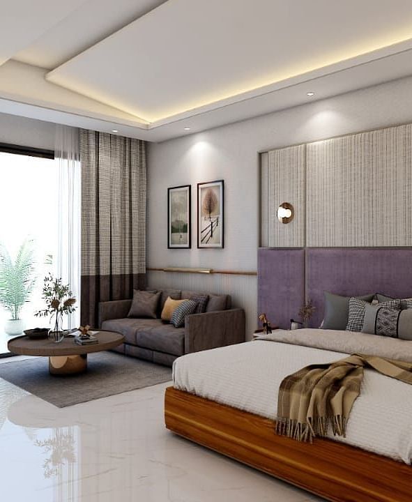 A beautiful room with ample of natural light coming from the huge french windows featuring a double bed in the room. - Namaste Corbett