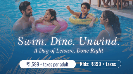 A promotional poster of Aamaghati Wildlife Resort showing families enjoying a swimming pool with children playing in inflatable rings while adults relax nearby, with a poolside dining setup and villa style buildings in the background, highlighting a swim a