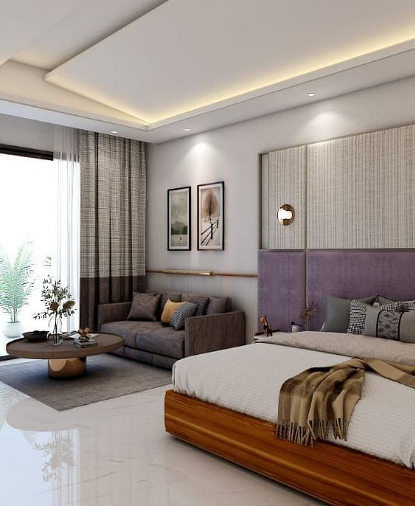 A beautiful room with ample of natural light coming from the huge french windows featuring a double bed in the room. - Namaste Corbett