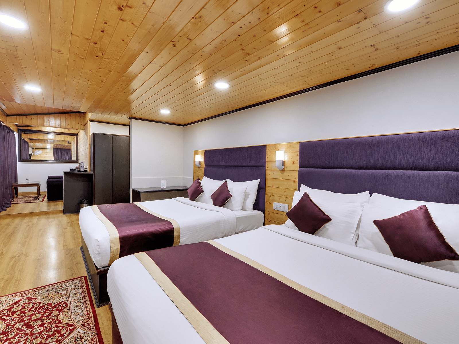 Deluxe Triple Room at Sumitel Darjeeling. A room with three beds, perfect for families or groups of friends.