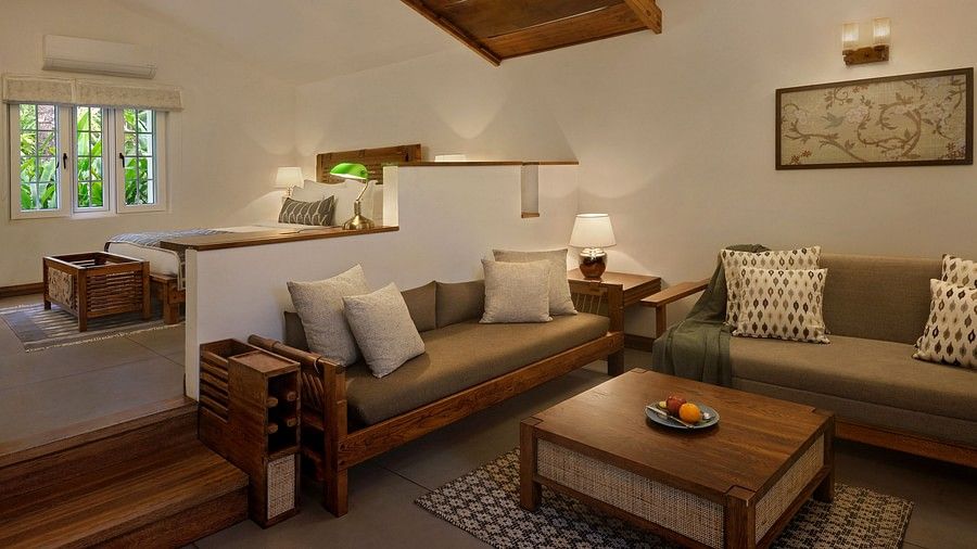 Cozy bathroom with a candle and skylight-Amanvana Spa Resort, Coorg - Luxury Resort