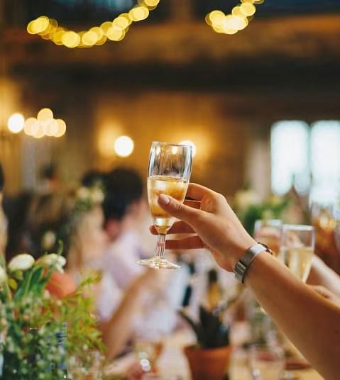 People raising a toast at an event