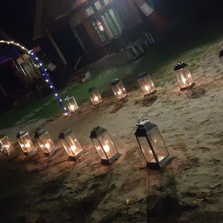 lanterns placed on either side for a grand entrance
