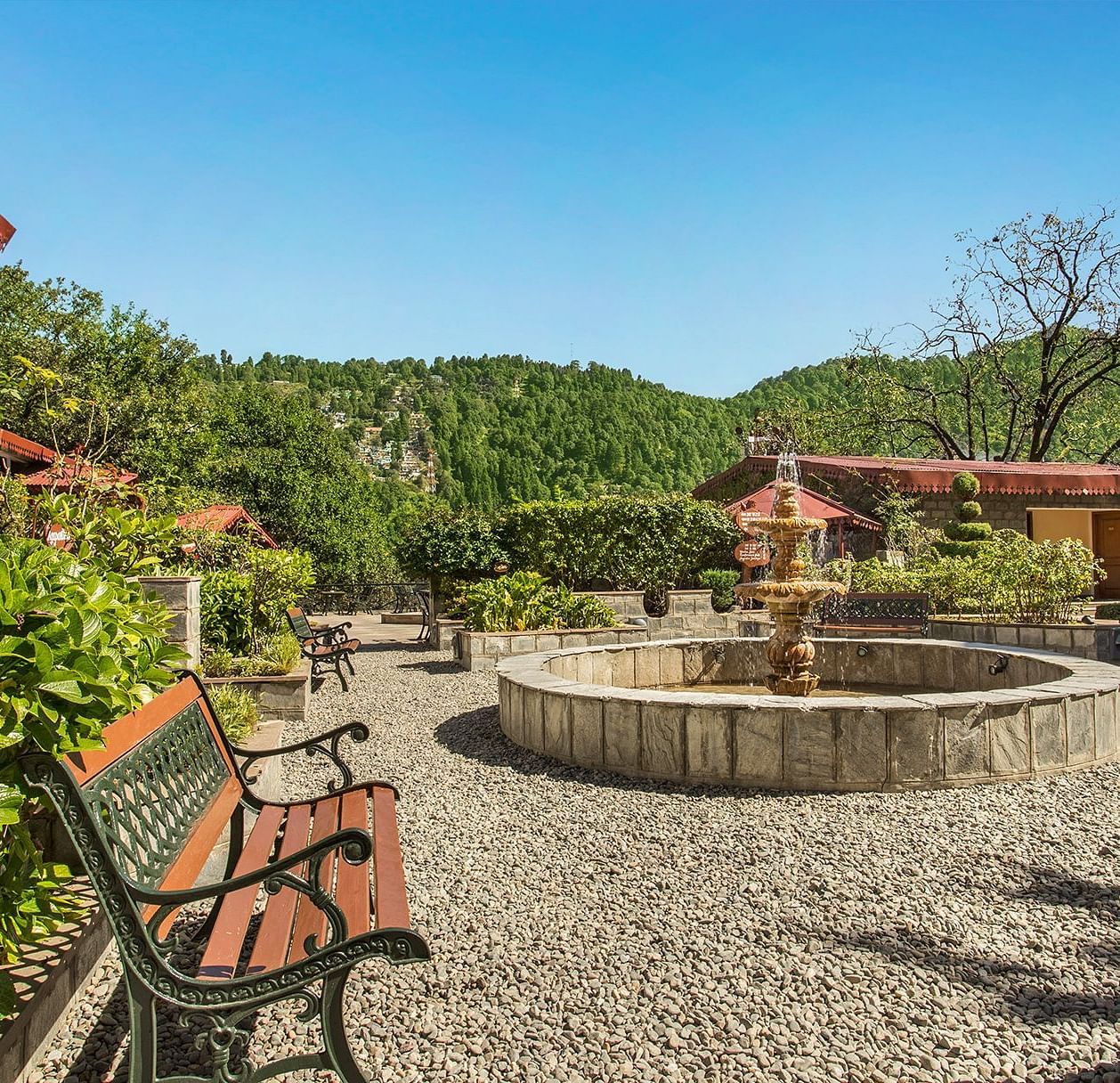 Courtyard with seating area and fountain at The Riverview Retreat, Corbett.