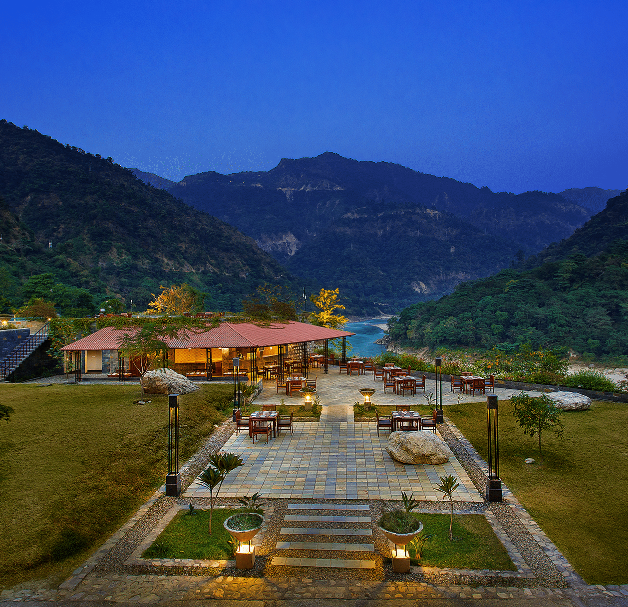 Leisure Hotels resort with mountains in the background.