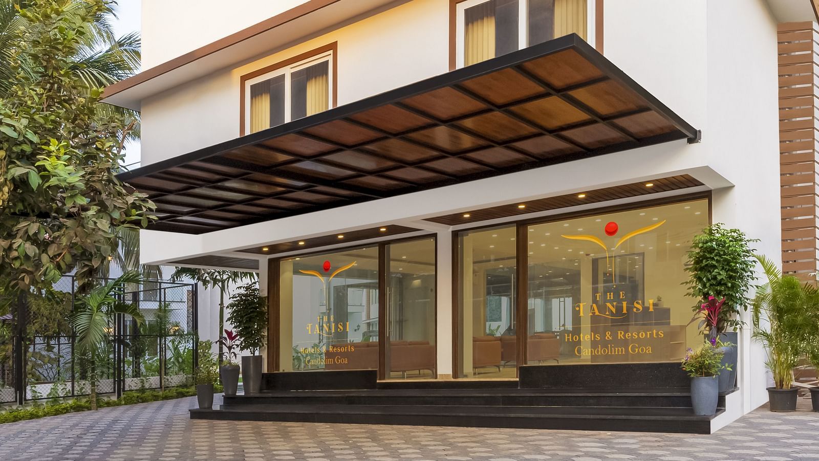 Facade view of The Tanisi Hotels & Resorts, Goa with the entrace in view