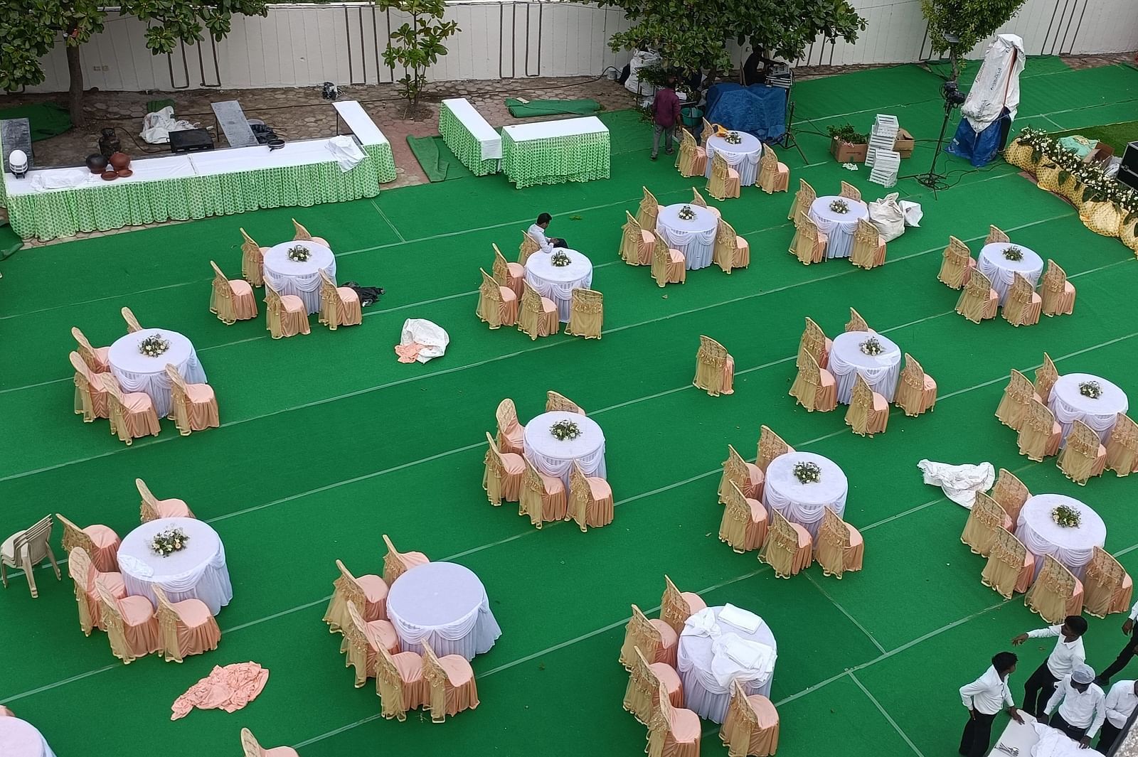 An aerial shot of our Starlight Garden venue in Tuticorin, featuring round tables with chairs placed around them - Regency Tuticorin by GRT Hotels