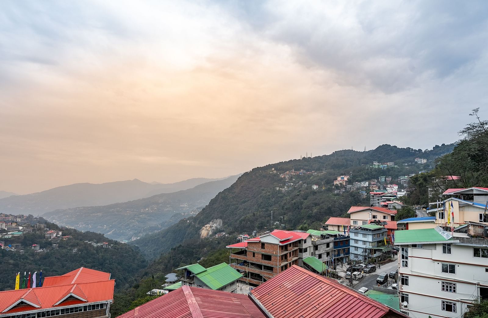 Scenic view of the hills with houses.