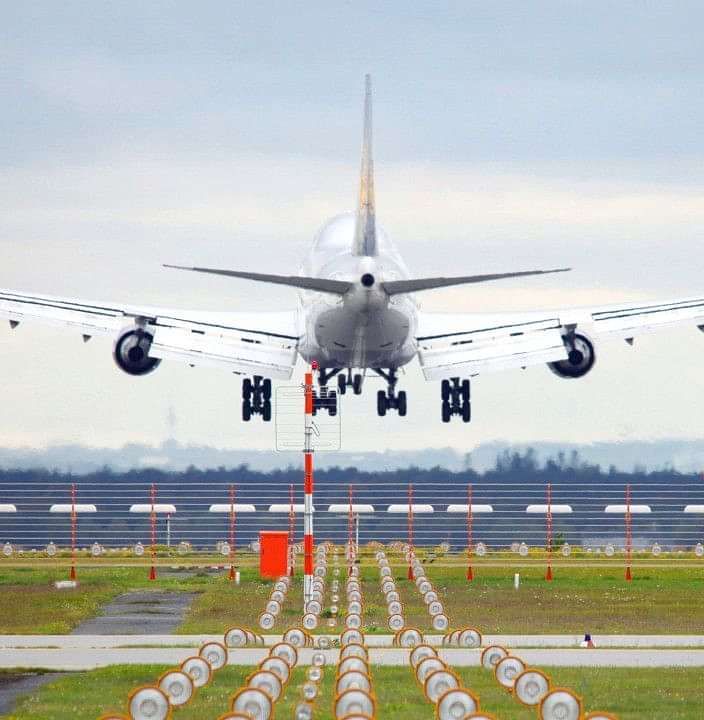 a plane landing on a runway