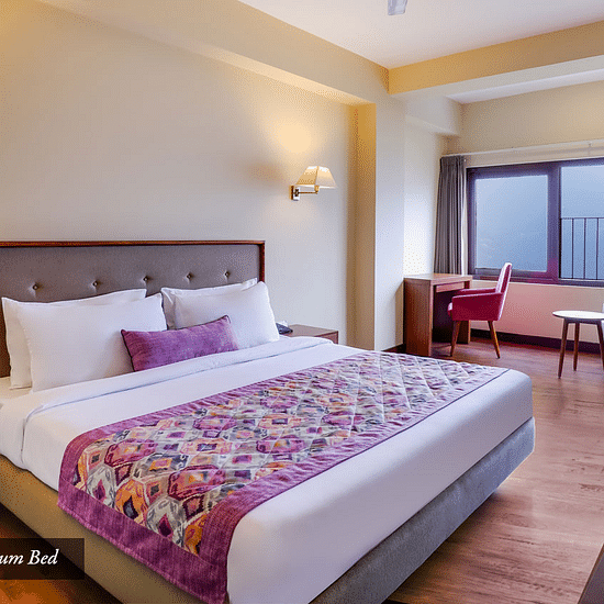 Deluxe-room-with-sofa-cum-bed