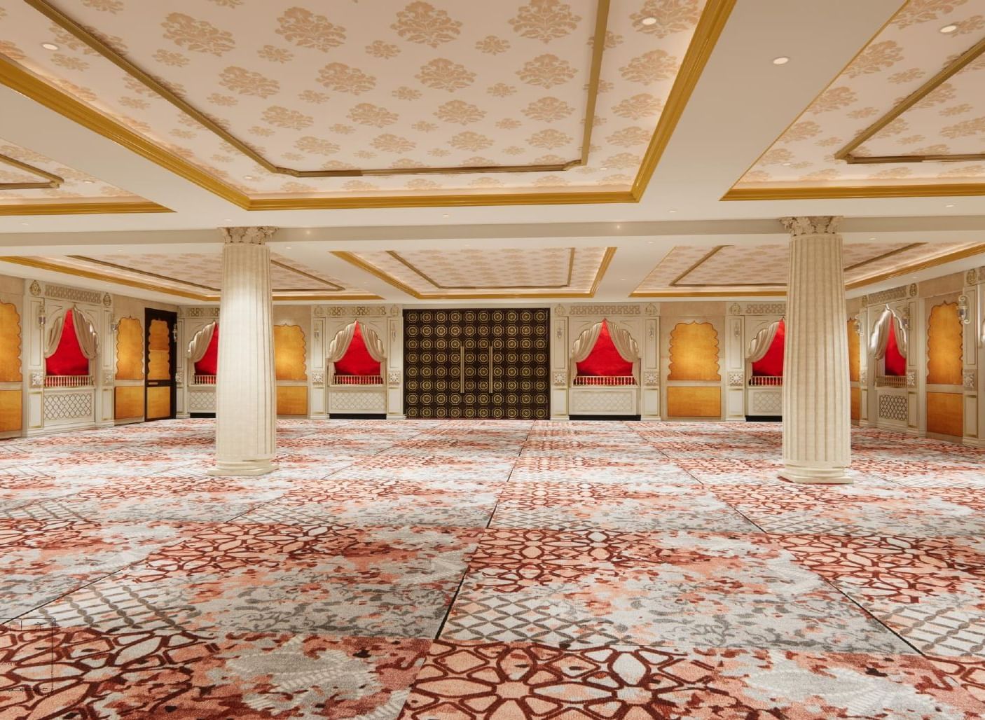 Event venue with floral-themed ceilings, towering pillars, soft ambient lighting, and walls mimicking traditional Indian window frames