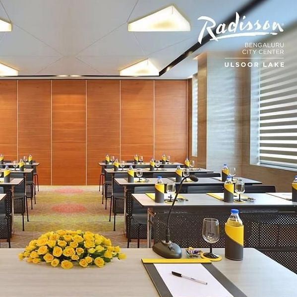 Modern conference room at Radisson Bengaluru City Center, set up for meetings with elegant decor.