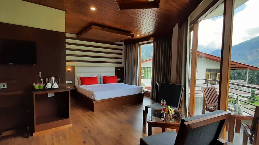 Wide-angle shot of family Suite along with scenic view from the balcony