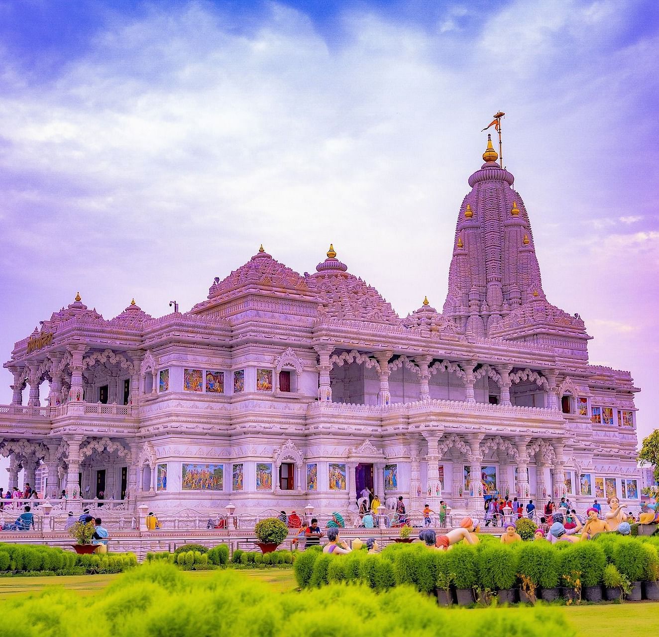 An image of a temple with set amidst the green plants and trees - Brij Eternity, Vrindavan