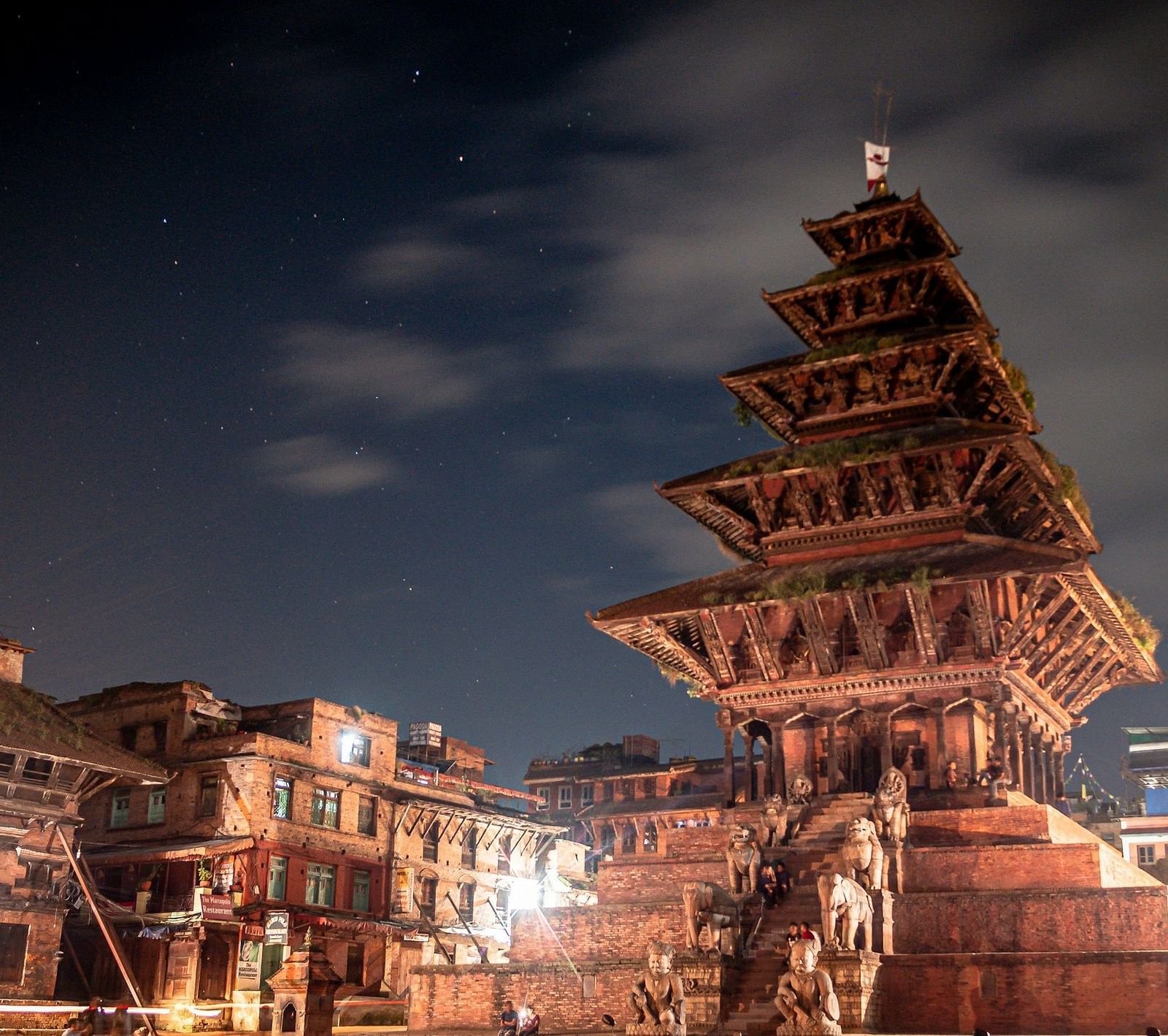 Nyatapola Temple's structure which is brightly lit with the backdrop of the night sky