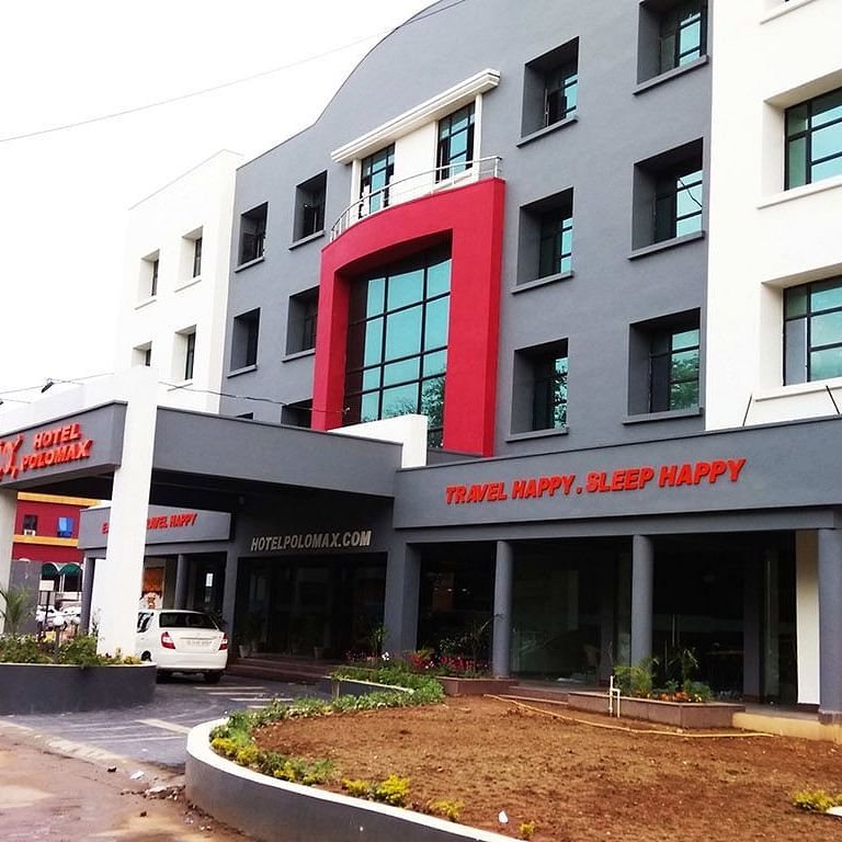 A side low angle shot of the hotel exterior during the day | Polo Max Hotels