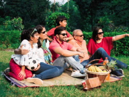 A family enjoying a picnic  with our activities in Chikmagalur