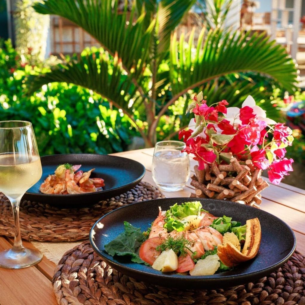 A tropical garden lunch with prawns, fresh salad, and wine - Tamarind Hills Resort and Villas - Antigua