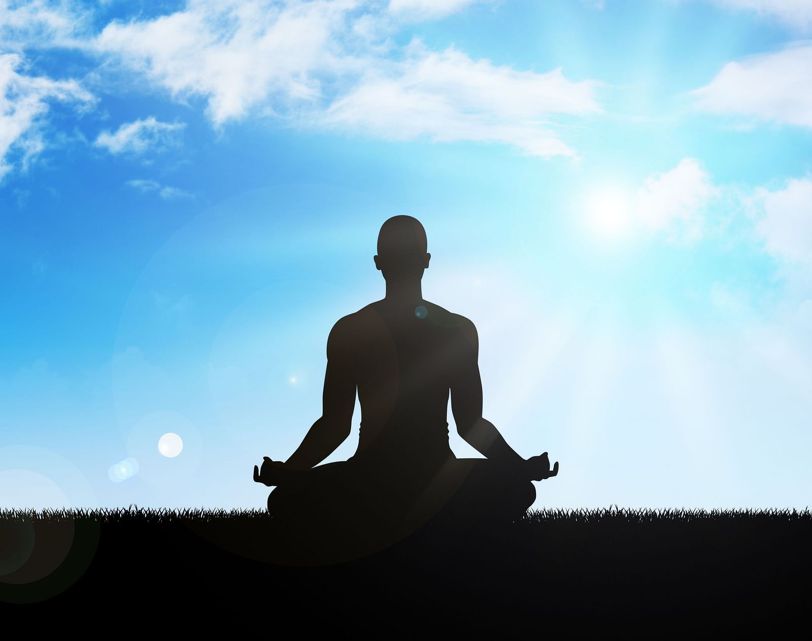 An image of a person performing yoga in day time