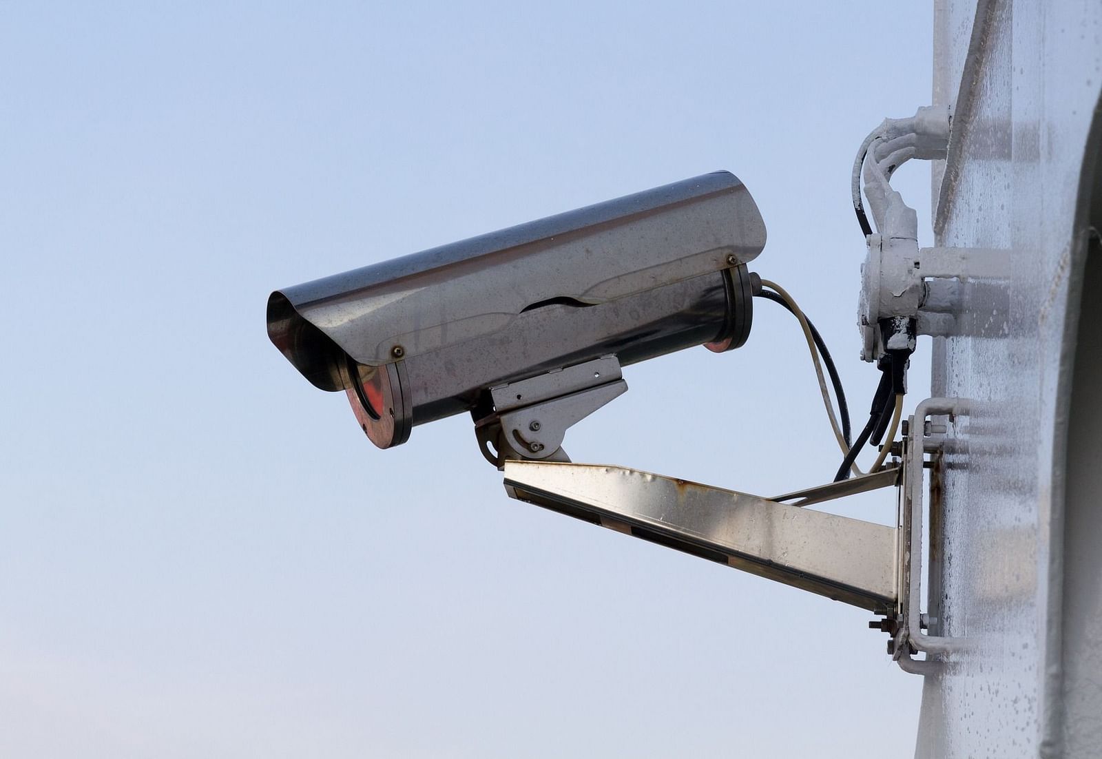 Image of a CCTV camera mounted on a wall.