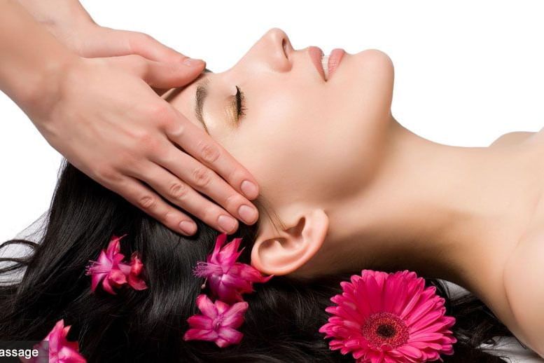 A woman receiving a massage at the spa inside The Retreat Hotel and Convention Centre
