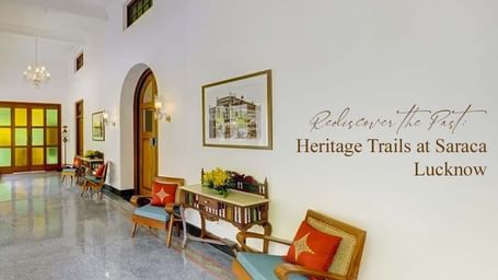 Heritage-style interior of Saraca Hotel Lucknow with the text Rediscover the Past: Heritage Trails at Saraca Lucknow.