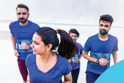 A marathon runner crossing the finish line, with the text The Entries Have Begun and Hurry Up!
