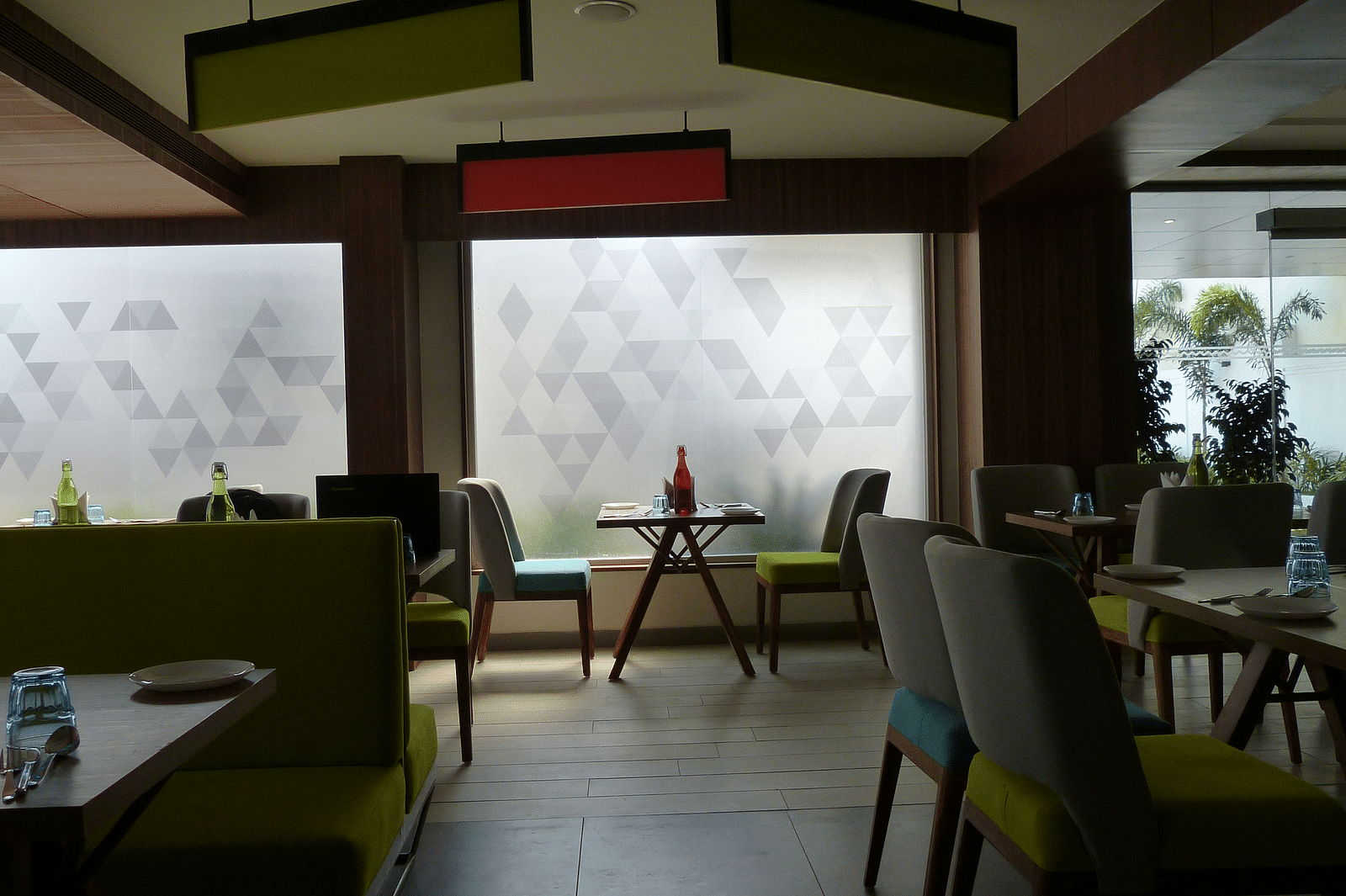 The dining area has chairs and tables arranged neatly for the guests