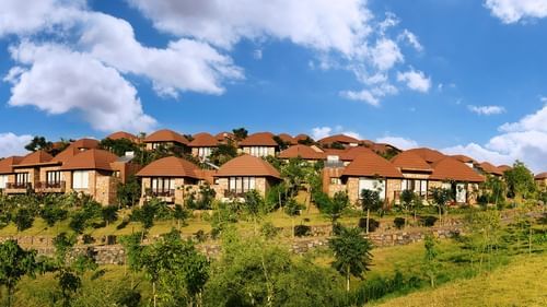 A wide view of the facade with greenery covered on either side - Ananta Udaipur