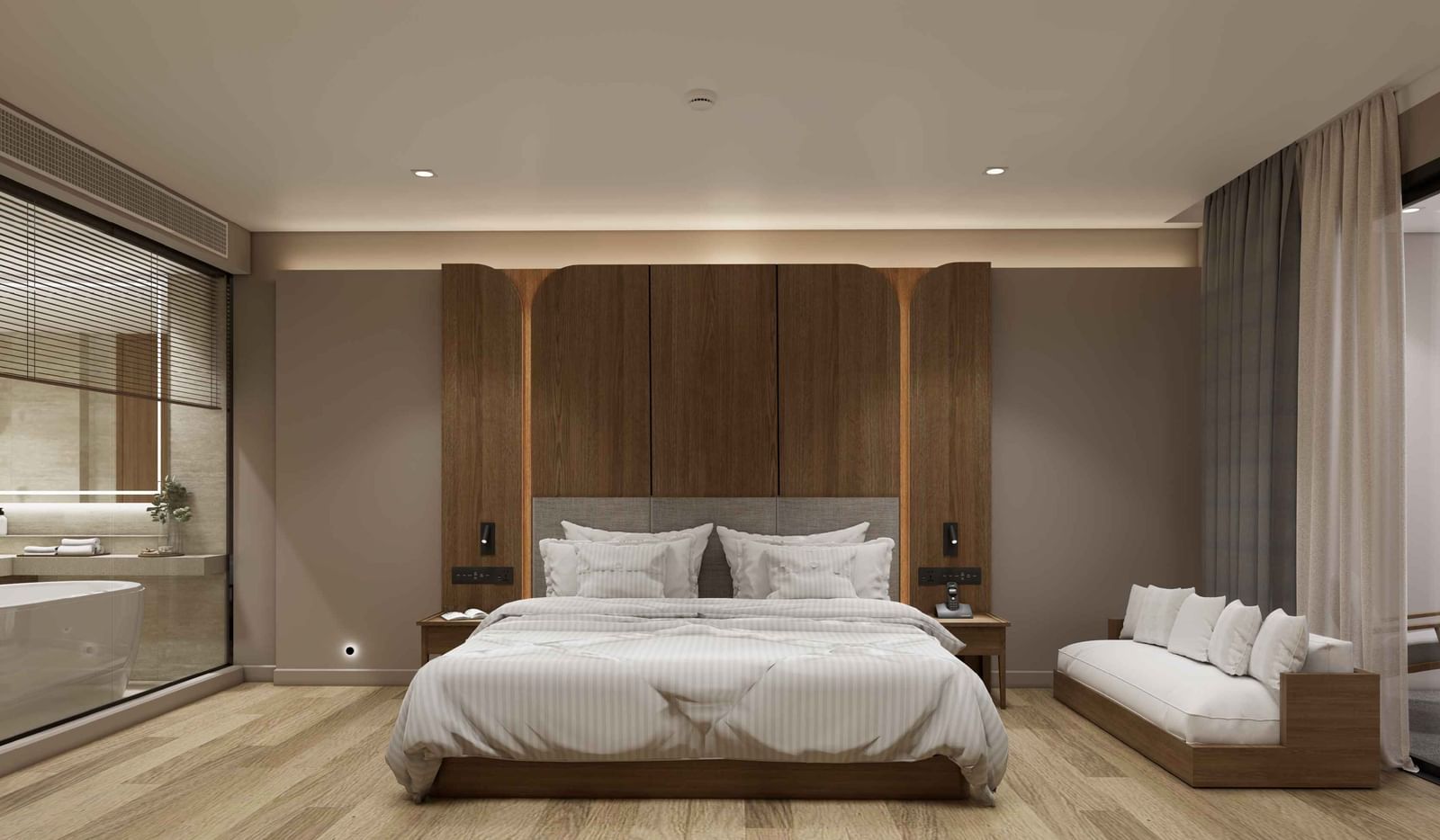 Bedroom with large bed, sofa, and wooden flooring at Ramada Resort by Wyndham Khao Lak.