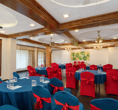 image of the spacious banquet hall at the summit barsana resort and spa in kalimpong