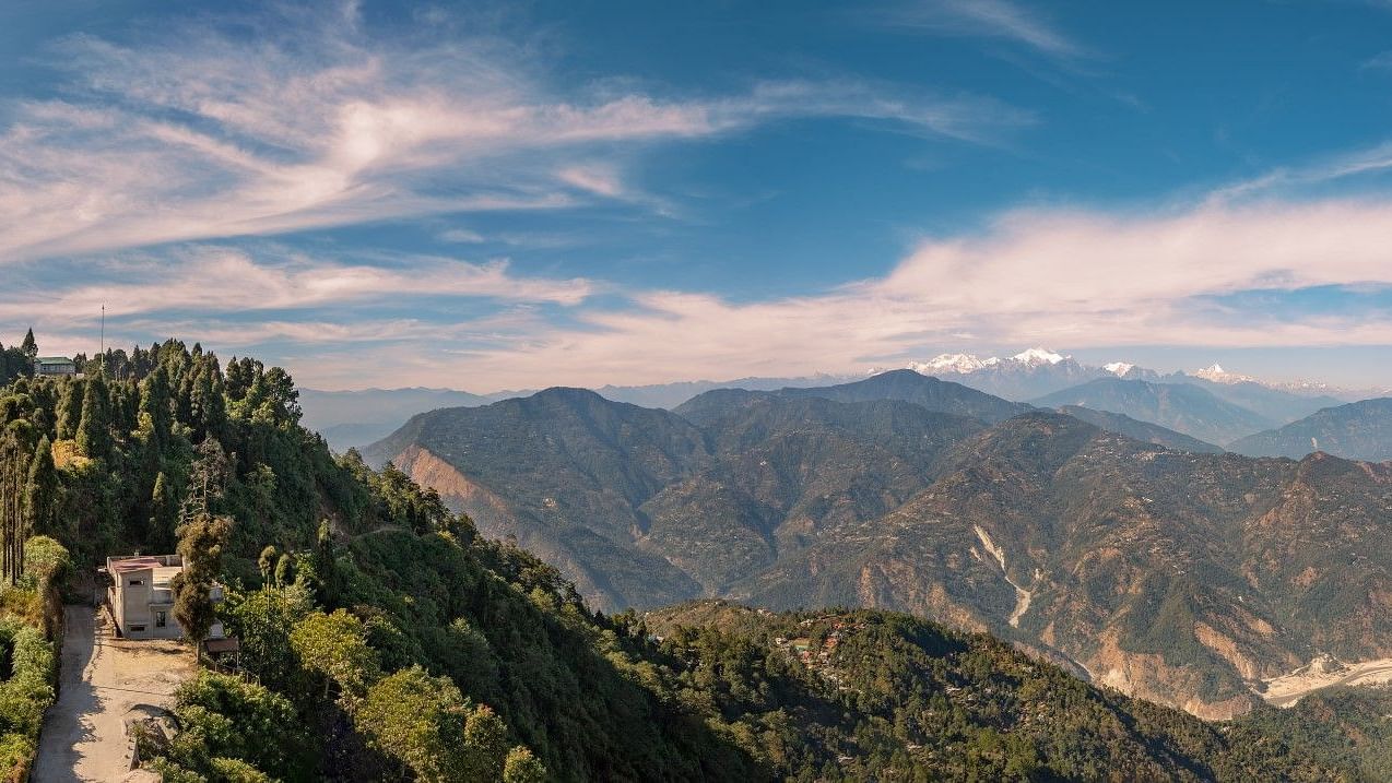 Image of lush mountain range with trees and and a clear sky at Summit Sherpa Mountain Hotel & Spa, Kalimpong