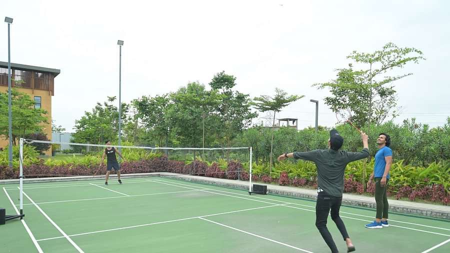People playing badminton at Singalila Club