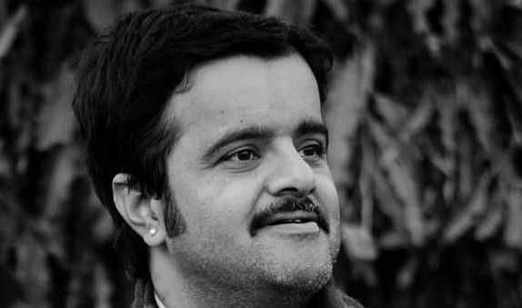 A black and white image of Luv Shekhawat