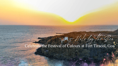 Sunset view over Fort Tiracol with the Arabian Sea glowing in warm golden hues.