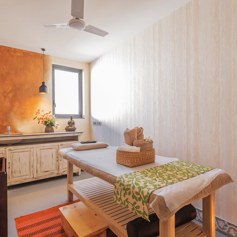 A spa room featuring all the necessary items required for a session or treatment - Karma Lakelands.