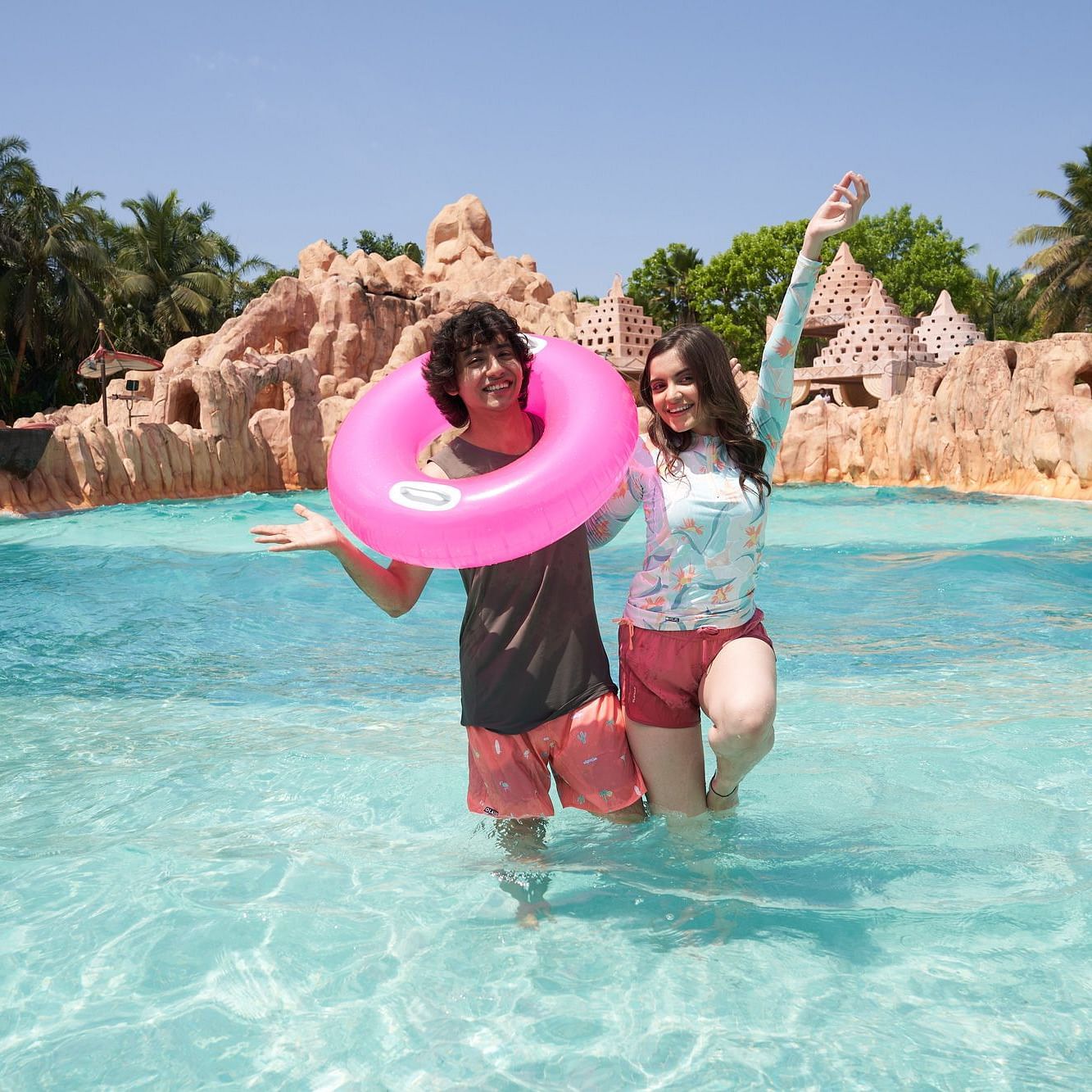 An image of a man and a woman enjoying themselves at the Wetlantic wave pool - Water Kingdom