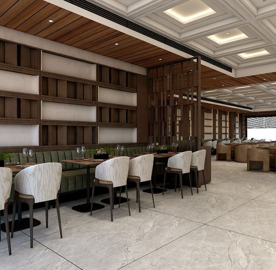 A restaurant with chic and modern interiors with several chairs surrounding the dining tables - Namaste Corbett