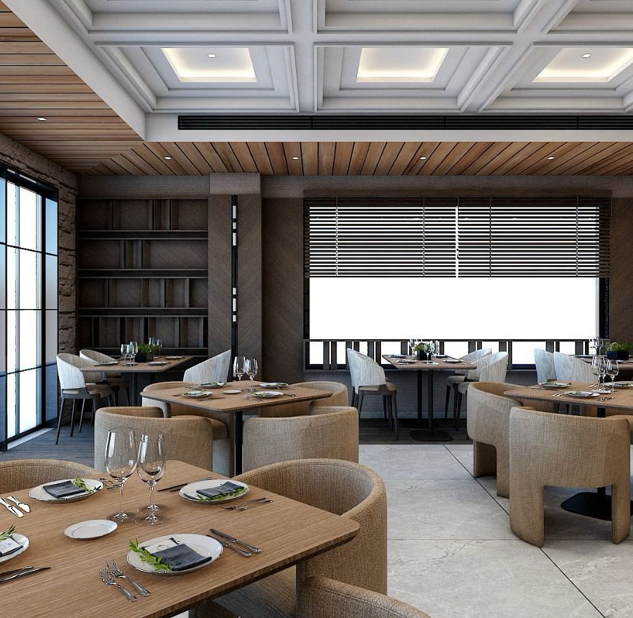 Dining tables placed besides the huge windows emitting plenty of natural light from outside - Namaste Corbett 
