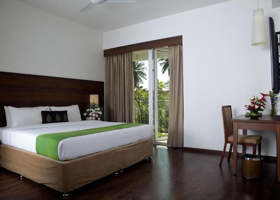 alt-text Temple Tree Hotel near Christ University, Temple Tree Hotel near NIMHANS Hospital Bangalore, best hotel near Christ University and NIMHANS Hospital near Hosur RoadGarden View Rooms, Stay Near Lalbagh, Temple Tree Hotel 2
