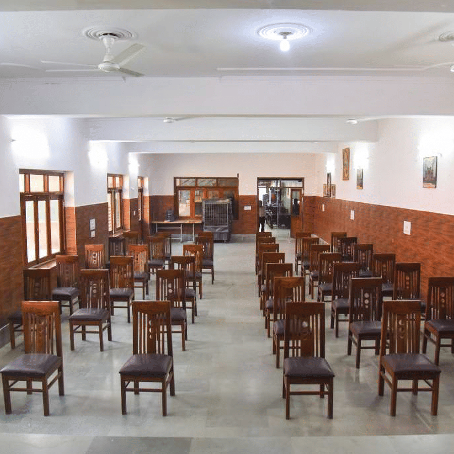 Meeting hall at Goverdhan Hotel with chairs lined up - Hotel Goverdhan, Agra