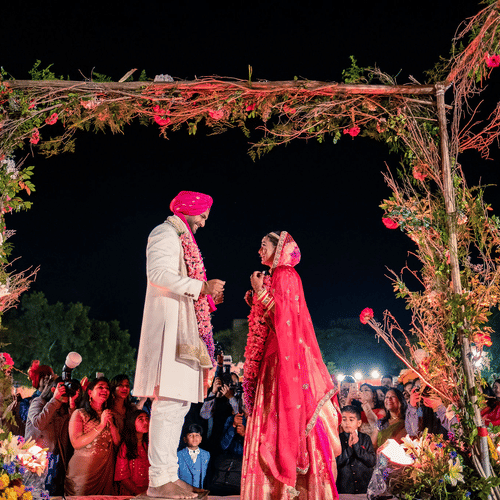 a punjabi couple during a varmala cermony