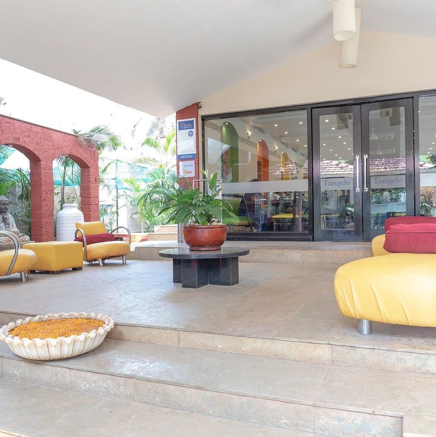 View of a cosy sitting area with sofas at Kyriad Prestige Calangute, Goa