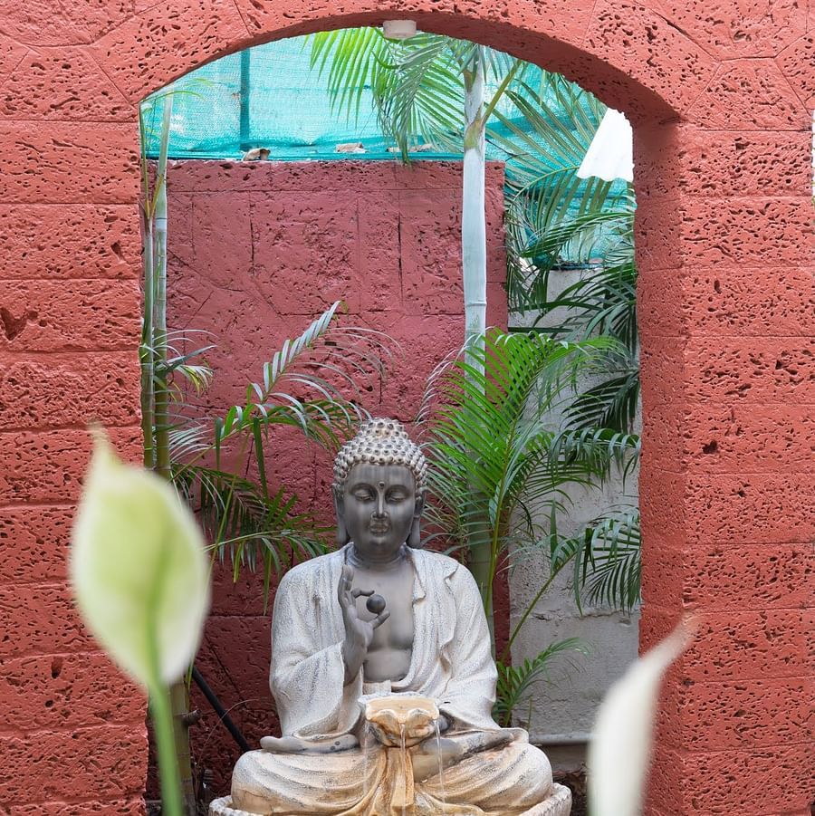 A statue of Buddha at Kyriad Prestige Calangute, Goa