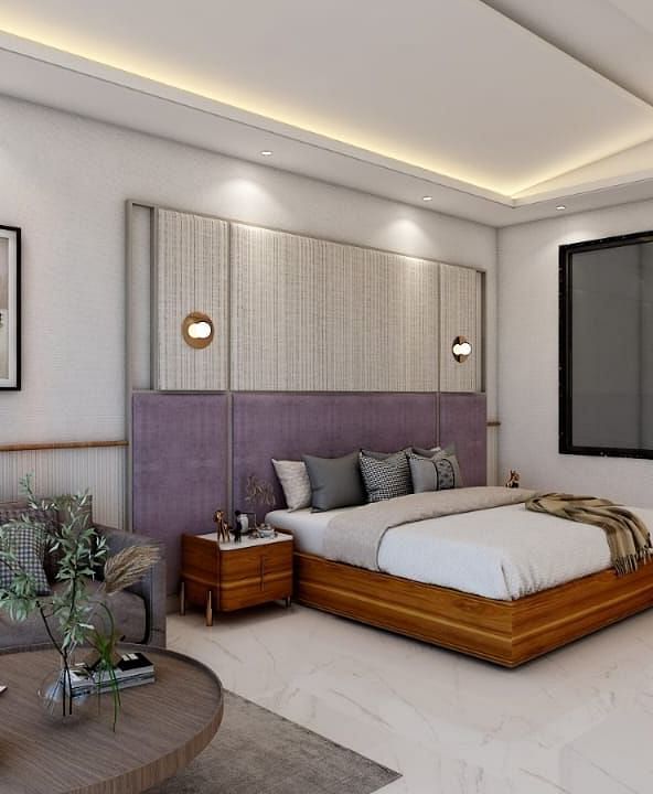 A spacious room featuring a double bed alongside a common seating area. - Namaste Corbett