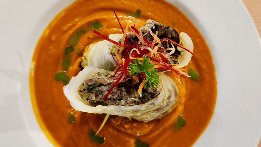 An elegant seafood dish swimming in a creamy sauce - Hotel 39, Jamaica