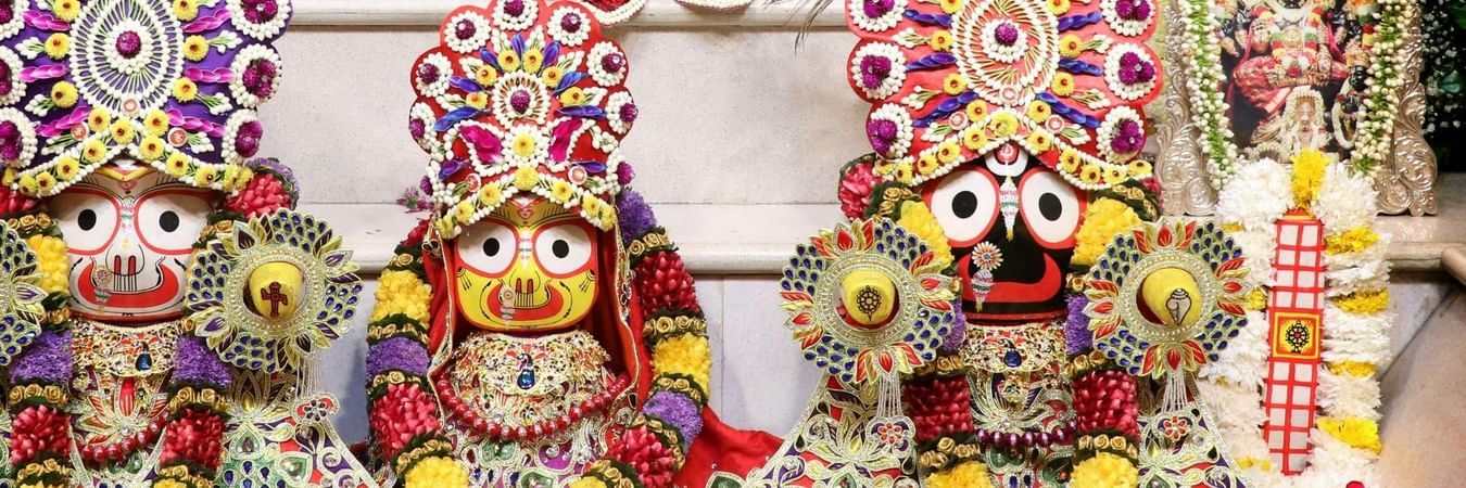 Colourful temple decorations with ornate religious artifacts and traditional festival arrangements