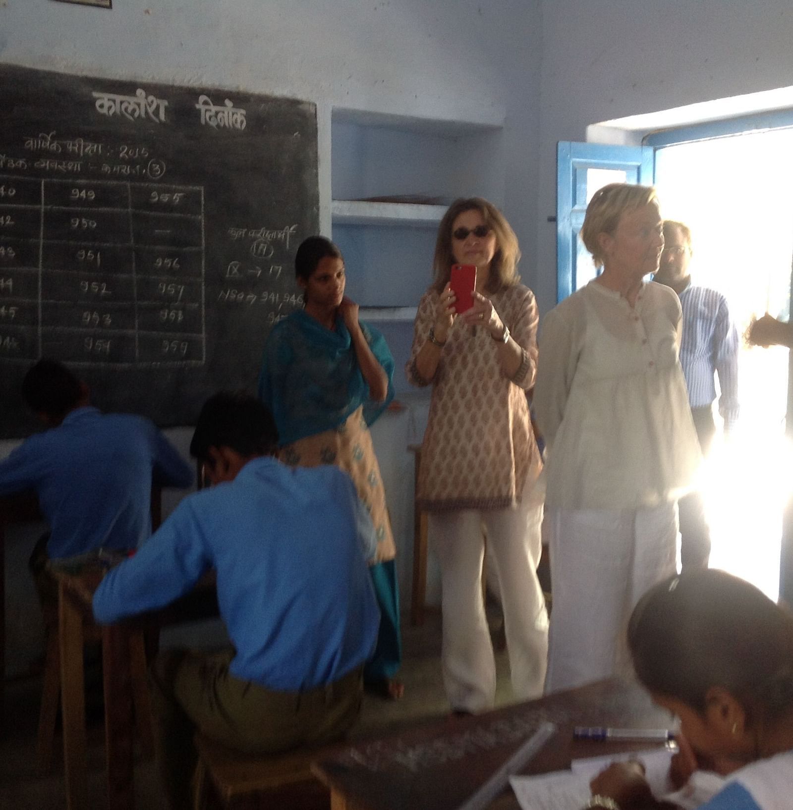 Tourists visiting a local school in rajasthan